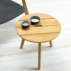 Ethimo Italian outdoor furniture in teak and refined finishes, displayed at Royal Interiors Singapore showroom