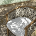 Ethimo Italian outdoor furniture in teak and refined finishes, displayed at Royal Interiors Singapore showroom