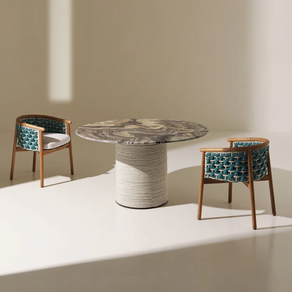 Ethimo Italian outdoor furniture in teak and refined finishes, displayed at Royal Interiors Singapore showroom