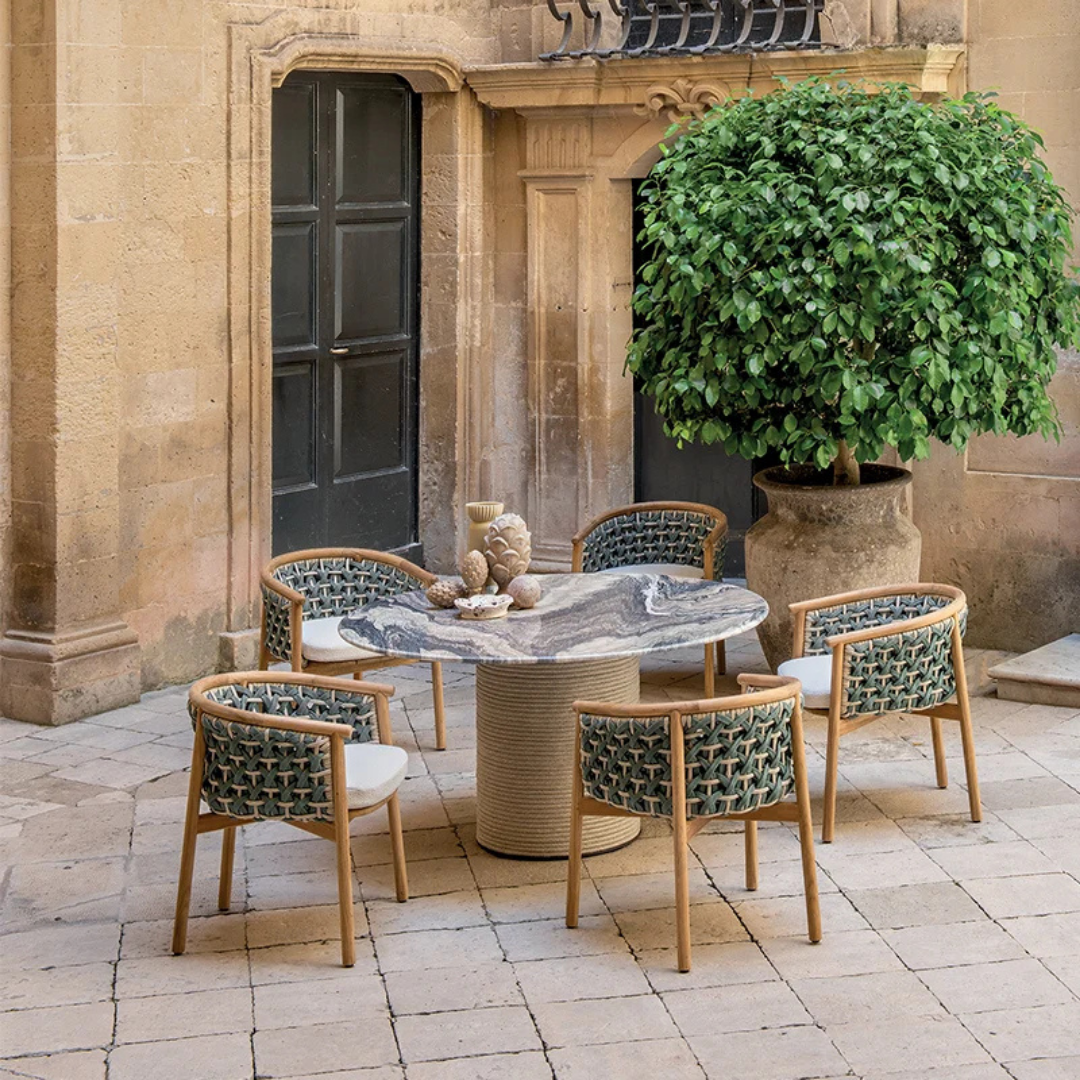 Ethimo Italian outdoor furniture in teak and refined finishes, displayed at Royal Interiors Singapore showroom