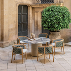 Ethimo Italian outdoor furniture in teak and refined finishes, displayed at Royal Interiors Singapore showroom