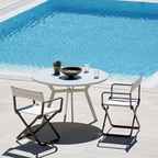 Ethimo Italian outdoor furniture in teak and refined finishes, displayed at Royal Interiors Singapore showroom