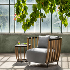 Ethimo Italian outdoor furniture in teak and refined finishes, displayed at Royal Interiors Singapore showroom