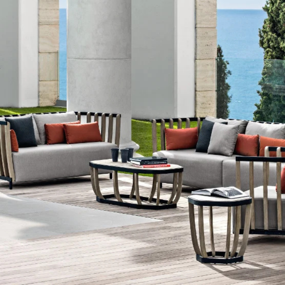 Ethimo Italian outdoor furniture in teak and refined finishes, displayed at Royal Interiors Singapore showroom