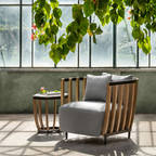 Ethimo Italian outdoor furniture in teak and refined finishes, displayed at Royal Interiors Singapore showroom