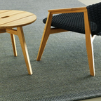 Ethimo Italian outdoor furniture in teak and refined finishes, displayed at Royal Interiors Singapore showroom