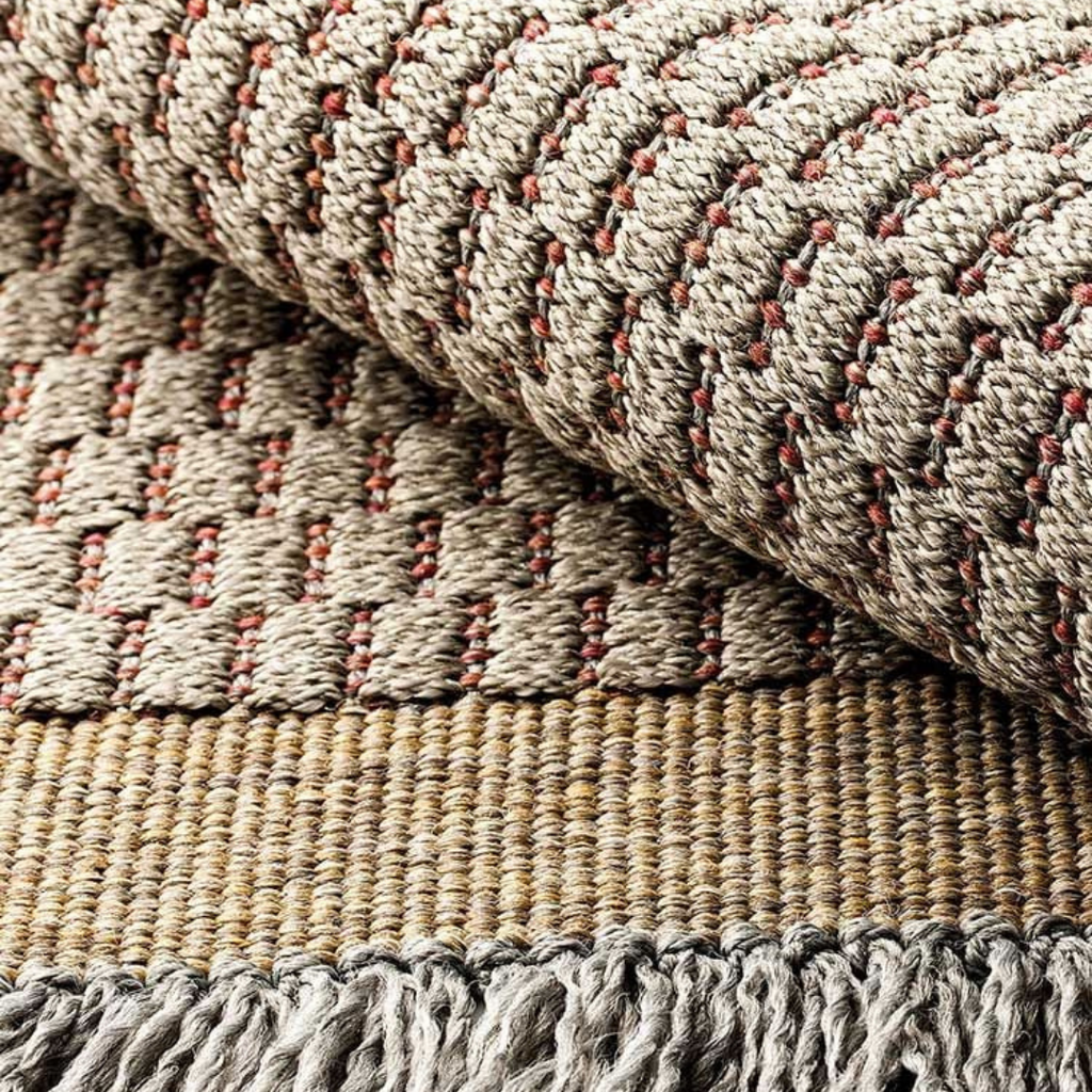 Ethimo Italian outdoor furniture in teak and refined finishes, displayed at Royal Interiors Singapore showroom