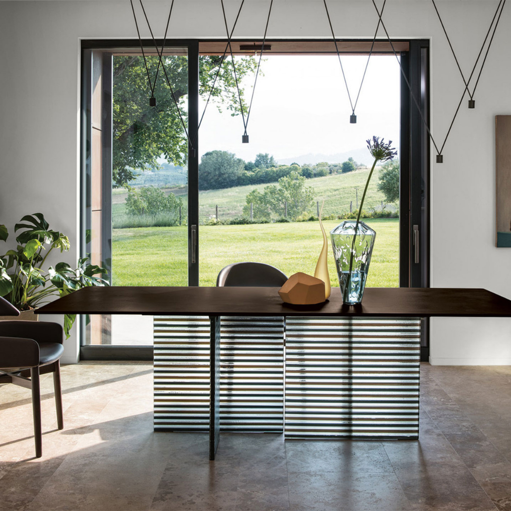 Fiam Italia designer glass furniture piece showcasing sculptural Italian craftsmanship and refined contemporary design.