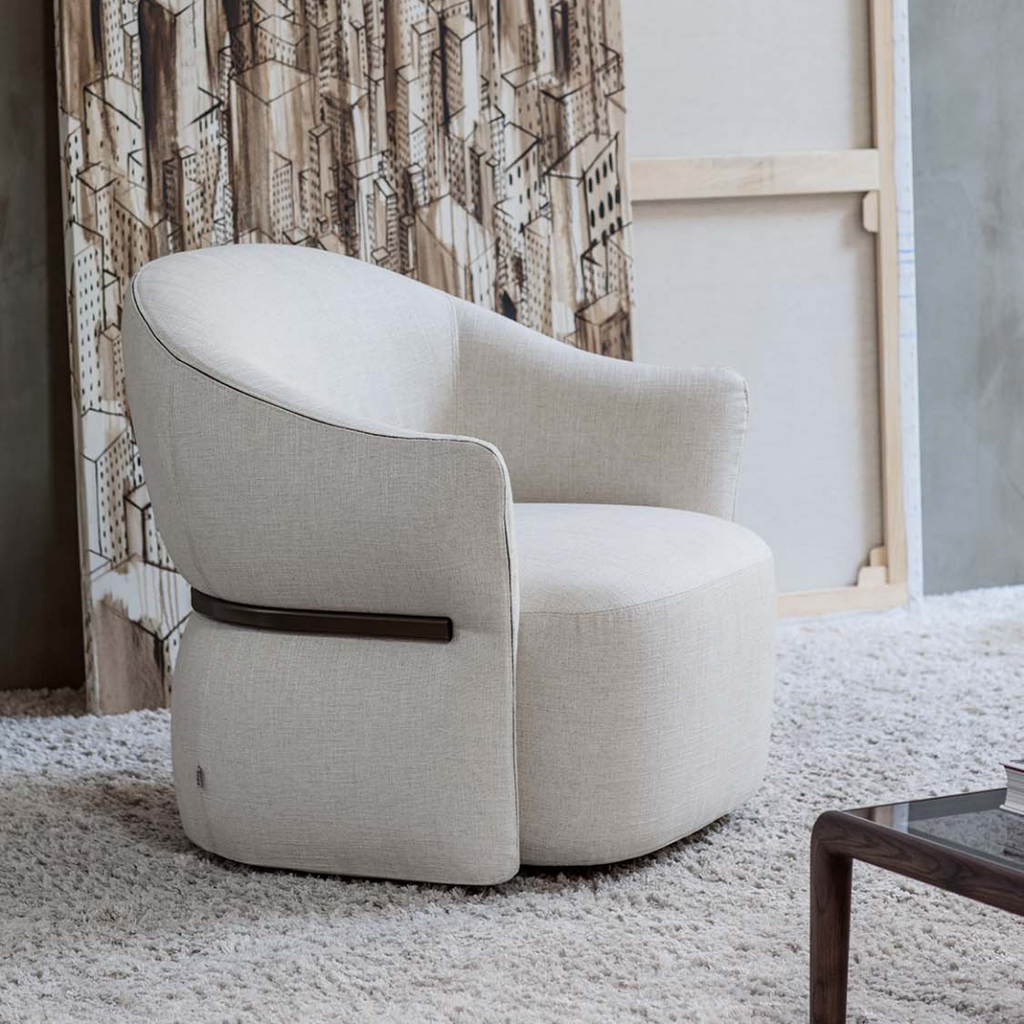 Luxury lounge armchair from Royal Interiors Singapore — designer seating crafted for modern comfort and timeless style.