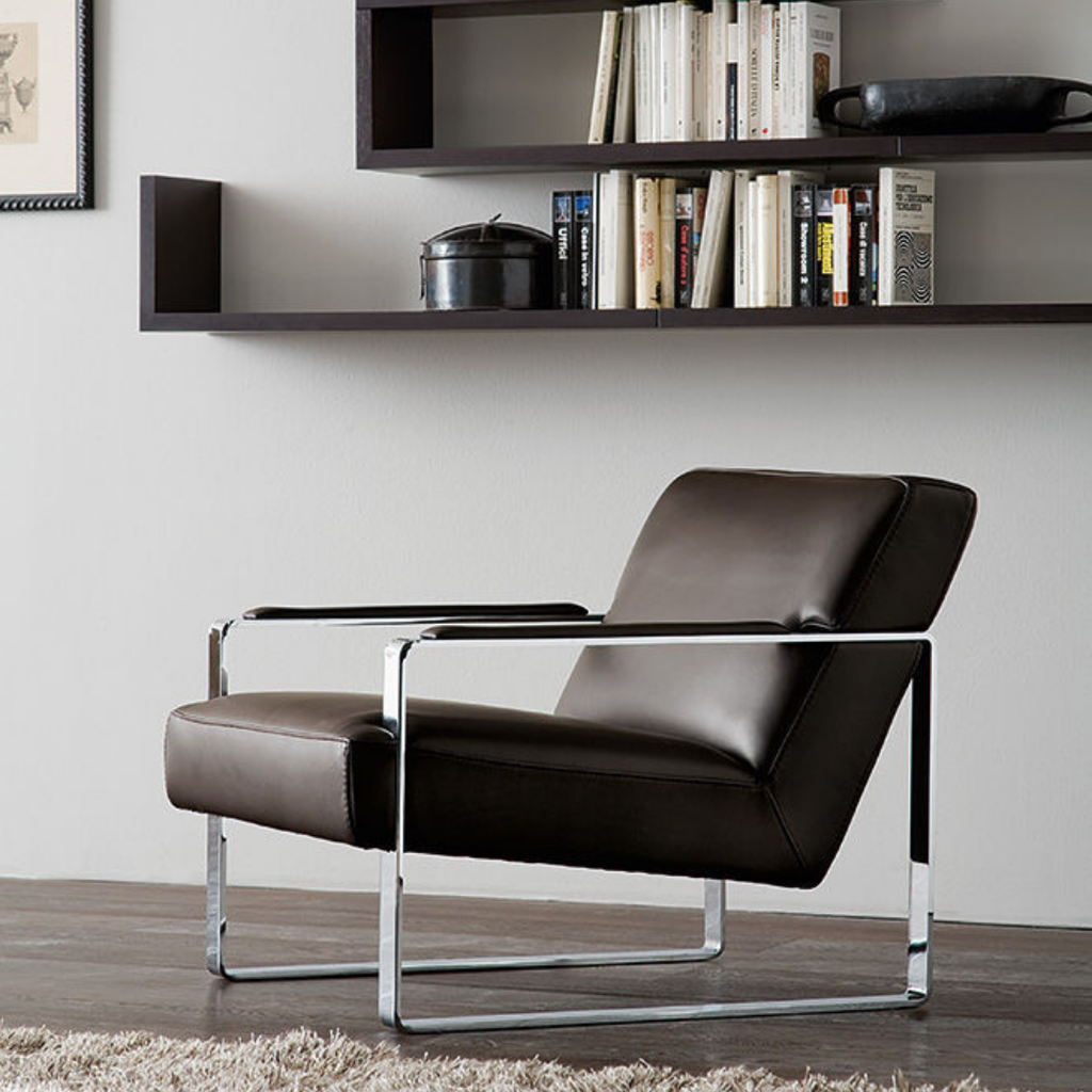 Luxury lounge armchair from Royal Interiors Singapore — designer seating crafted for modern comfort and timeless style.