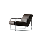 Luxury lounge armchair from Royal Interiors Singapore — designer seating crafted for modern comfort and timeless style.