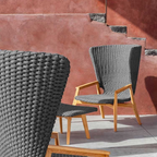 Ethimo Italian outdoor furniture in teak and refined finishes, displayed at Royal Interiors Singapore showroom