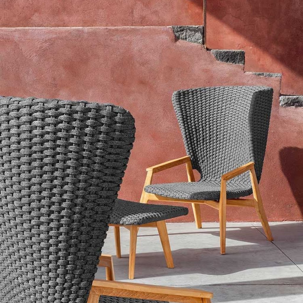 Ethimo Italian outdoor furniture in teak and refined finishes, displayed at Royal Interiors Singapore showroom