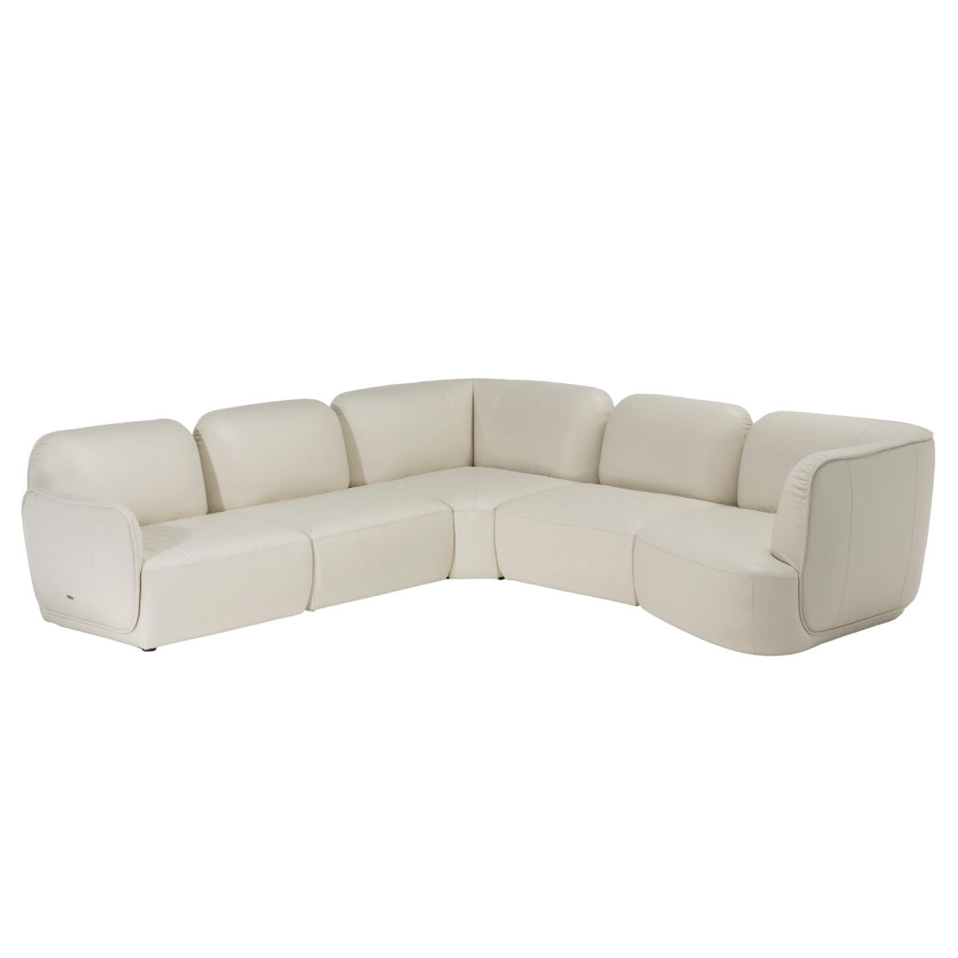 Natuzzi Editions indoor furniture including lounge armchairs, coffee tables, side tables, and bedside tables at Royal Interiors Singapore showroom.