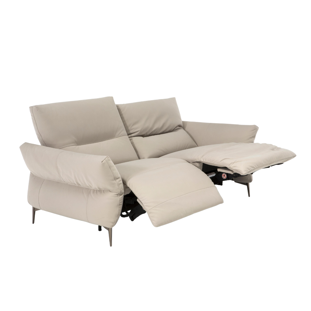 Natuzzi Editions indoor furniture including lounge armchairs, coffee tables, side tables, and bedside tables at Royal Interiors Singapore showroom.