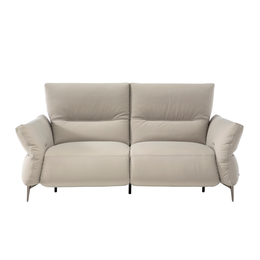 Natuzzi Editions indoor furniture including lounge armchairs, coffee tables, side tables, and bedside tables at Royal Interiors Singapore showroom.