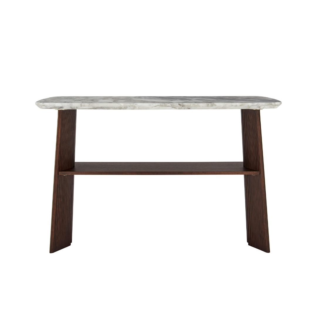 Natuzzi Editions indoor furniture including lounge armchairs, coffee tables, side tables, and bedside tables at Royal Interiors Singapore showroom.