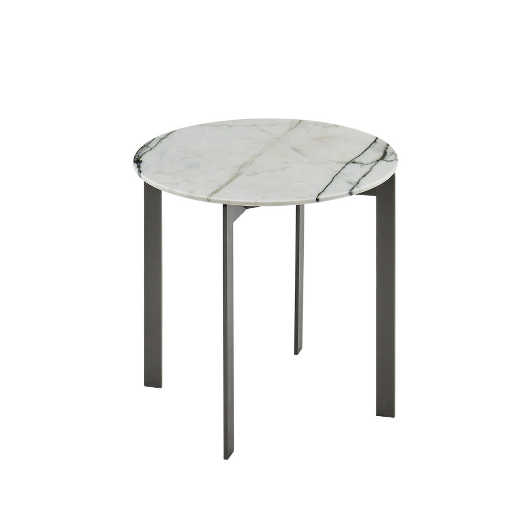 Natuzzi Editions indoor furniture including lounge armchairs, coffee tables, side tables, and bedside tables at Royal Interiors Singapore showroom.