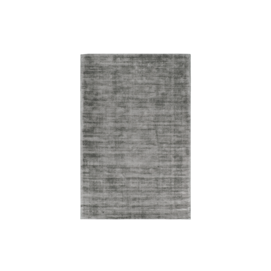 Natuzzi Editions indoor furniture including lounge armchairs, coffee tables, side tables, and bedside tables at Royal Interiors Singapore showroom.