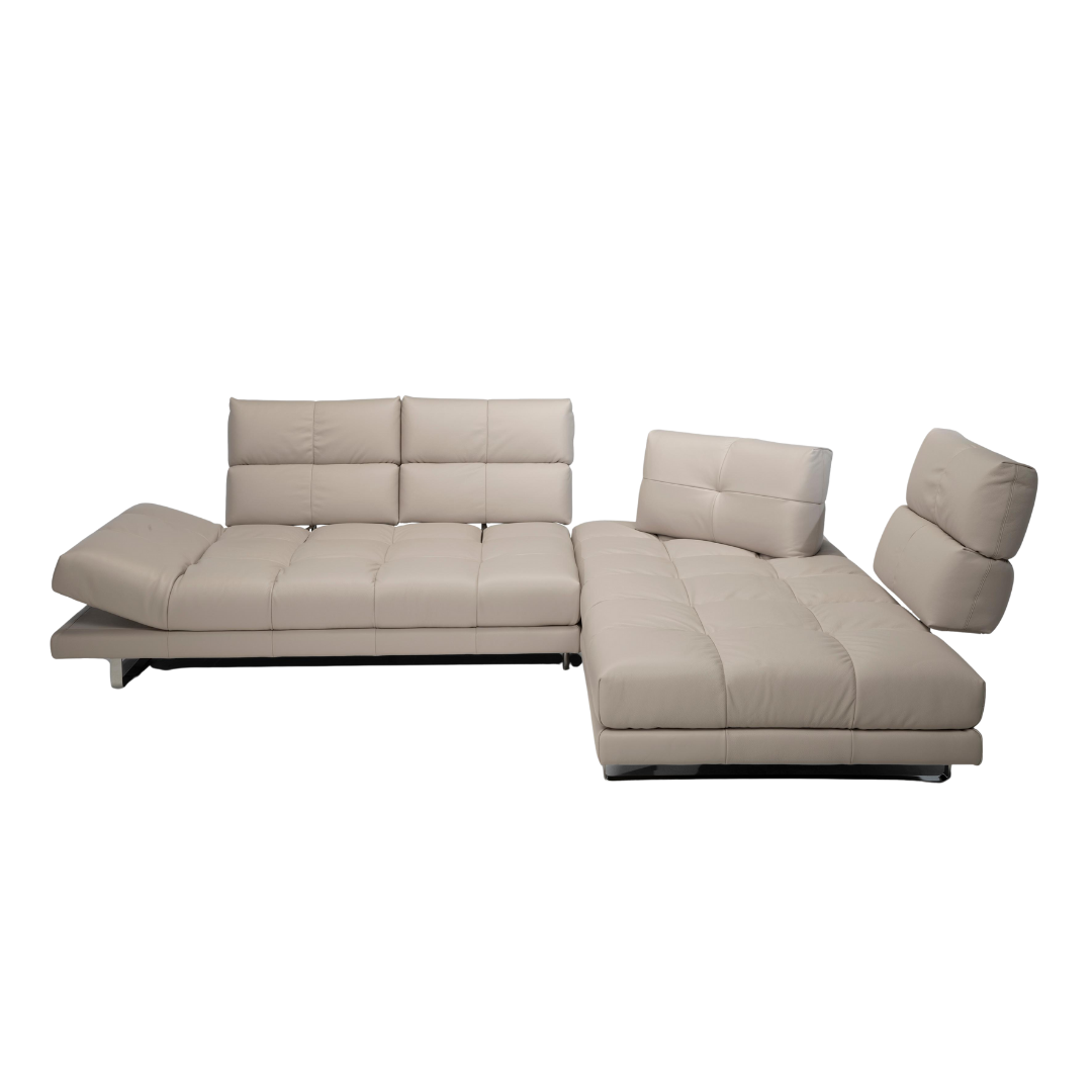 Natuzzi Editions indoor furniture including lounge armchairs, coffee tables, side tables, and bedside tables at Royal Interiors Singapore showroom.