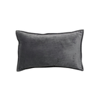 Natuzzi Italia indoor furniture including lounge armchairs, coffee tables, side tables, and bedside tables at Royal Interiors Singapore showroom.