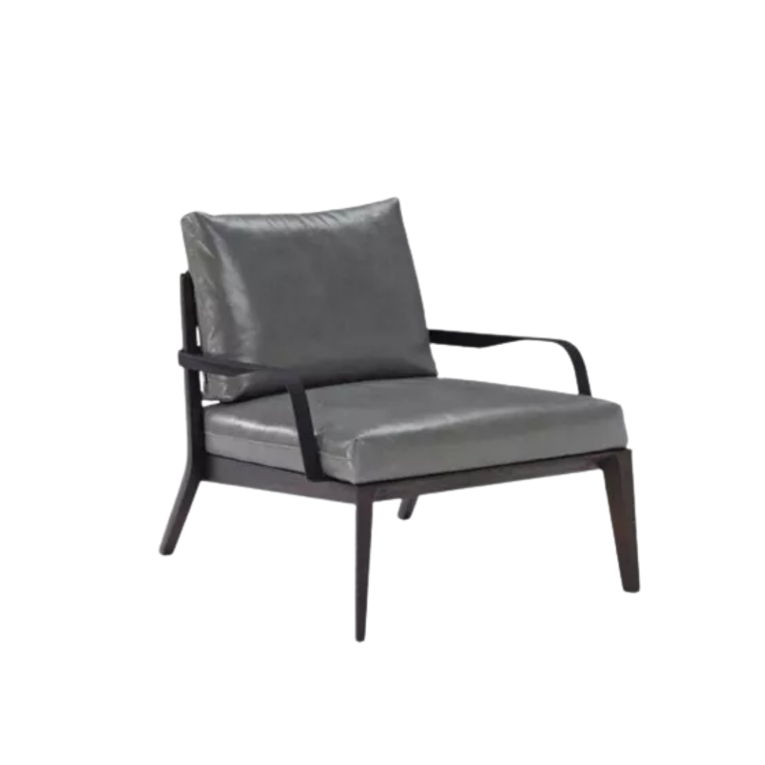 Natuzzi Italia indoor furniture including lounge armchairs, coffee tables, side tables, and bedside tables at Royal Interiors Singapore showroom.