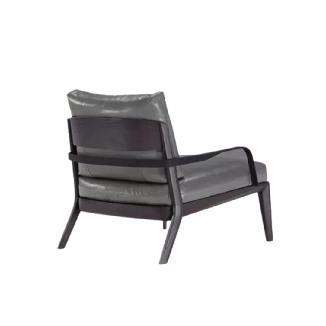 Natuzzi Italia indoor furniture including lounge armchairs, coffee tables, side tables, and bedside tables at Royal Interiors Singapore showroom.