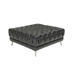 Natuzzi Italia indoor furniture including lounge armchairs, coffee tables, side tables, and bedside tables at Royal Interiors Singapore showroom.