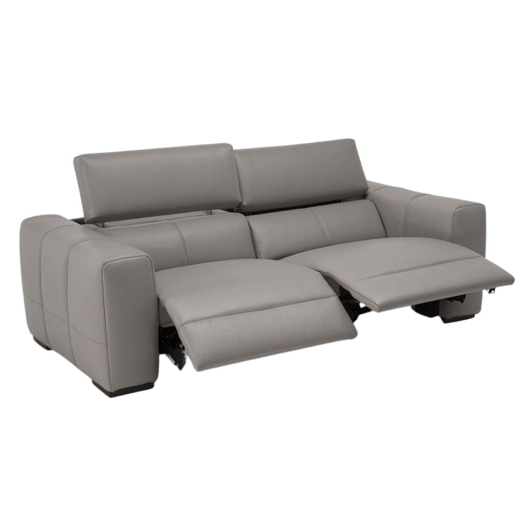 Natuzzi Italia indoor furniture including lounge armchairs, coffee tables, side tables, and bedside tables at Royal Interiors Singapore showroom.