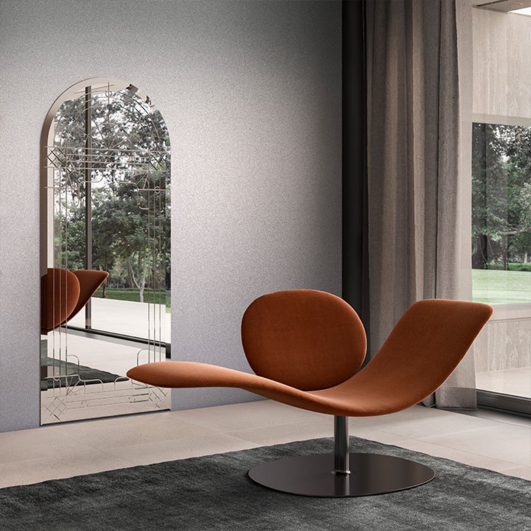 Natuzzi Italia indoor furniture including lounge armchairs, coffee tables, side tables, and bedside tables at Royal Interiors Singapore showroom.