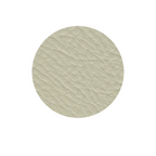 Natuzzi Italia indoor furniture including lounge armchairs, coffee tables, side tables, and bedside tables at Royal Interiors Singapore showroom.