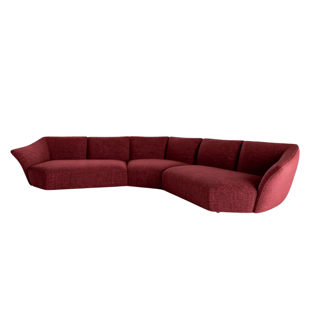 Natuzzi Italia indoor furniture including lounge armchairs, coffee tables, side tables, and bedside tables at Royal Interiors Singapore showroom.