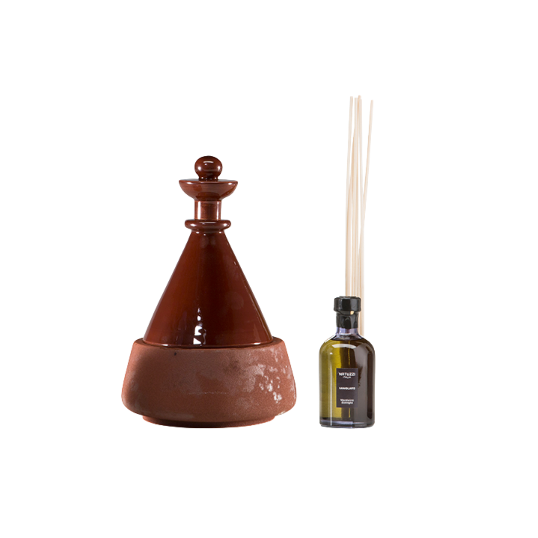 Natuzzi Italia indoor furniture including lounge armchairs, coffee tables, side tables, and bedside tables at Royal Interiors Singapore showroom.