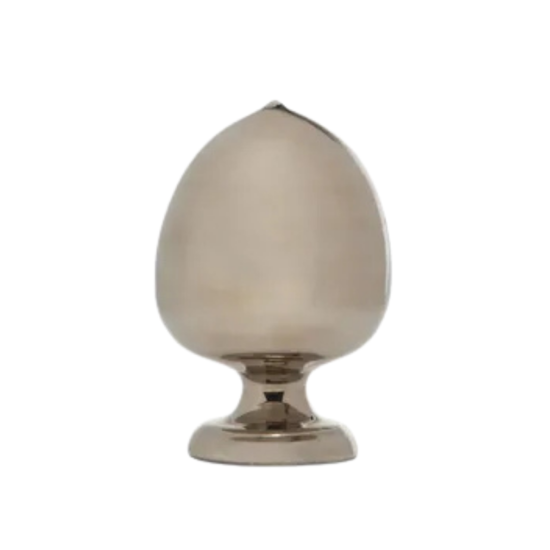 Natuzzi Italia indoor furniture including lounge armchairs, coffee tables, side tables, and bedside tables at Royal Interiors Singapore showroom.