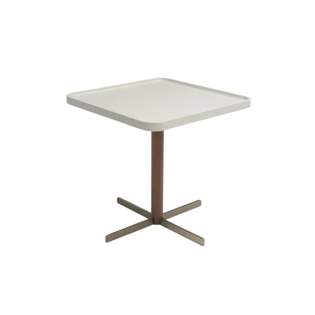 Natuzzi Italia indoor furniture including lounge armchairs, coffee tables, side tables, and bedside tables at Royal Interiors Singapore showroom.