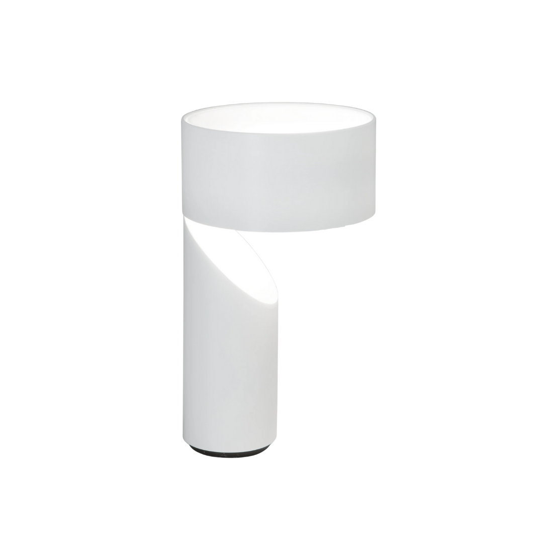 Natuzzi Italia indoor furniture including lounge armchairs, coffee tables, side tables, and bedside tables at Royal Interiors Singapore showroom.