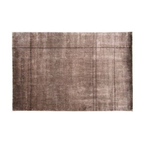 Natuzzi Italia indoor furniture including lounge armchairs, coffee tables, side tables, and bedside tables at Royal Interiors Singapore showroom.