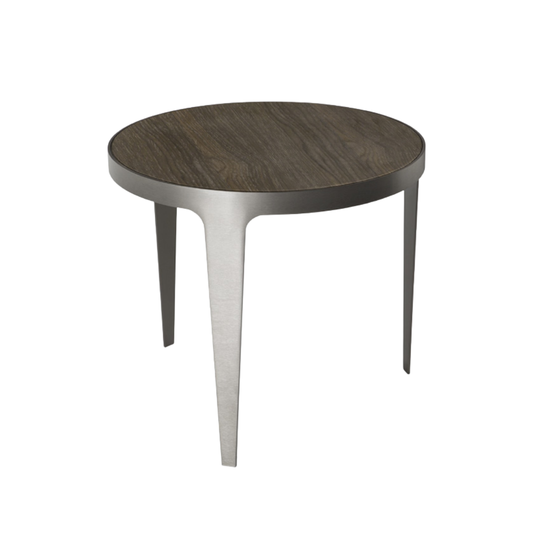 Natuzzi Italia indoor furniture including lounge armchairs, coffee tables, side tables, and bedside tables at Royal Interiors Singapore showroom.