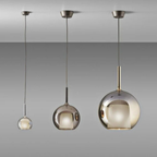 Penta Italian designer lighting featuring sculptural mirrored floor and pendant lights displayed in a luxury Singapore showroom