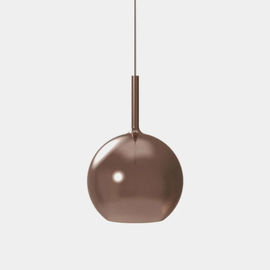 Penta Italian designer lighting featuring sculptural mirrored floor and pendant lights displayed in a luxury Singapore showroom