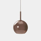 Penta Italian designer lighting featuring sculptural mirrored floor and pendant lights displayed in a luxury Singapore showroom