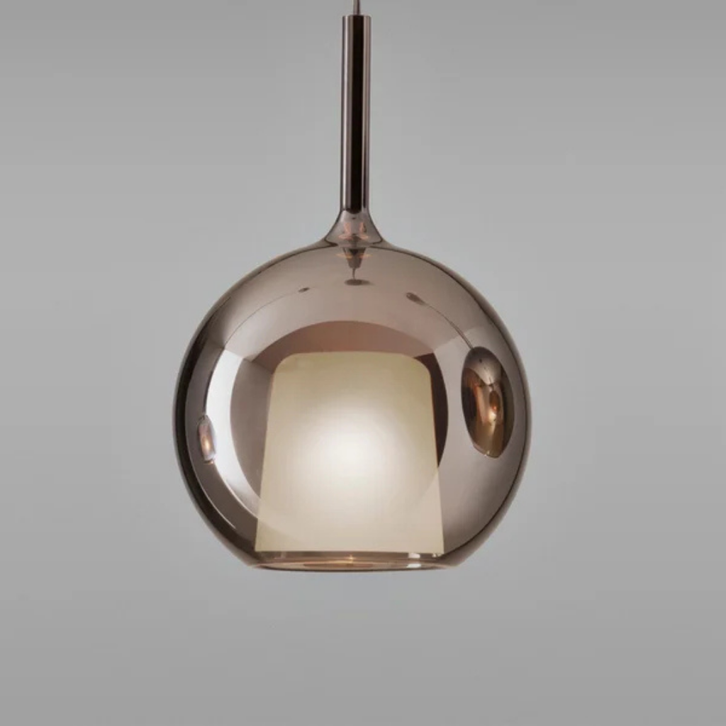 Penta Italian designer lighting featuring sculptural mirrored floor and pendant lights displayed in a luxury Singapore showroom