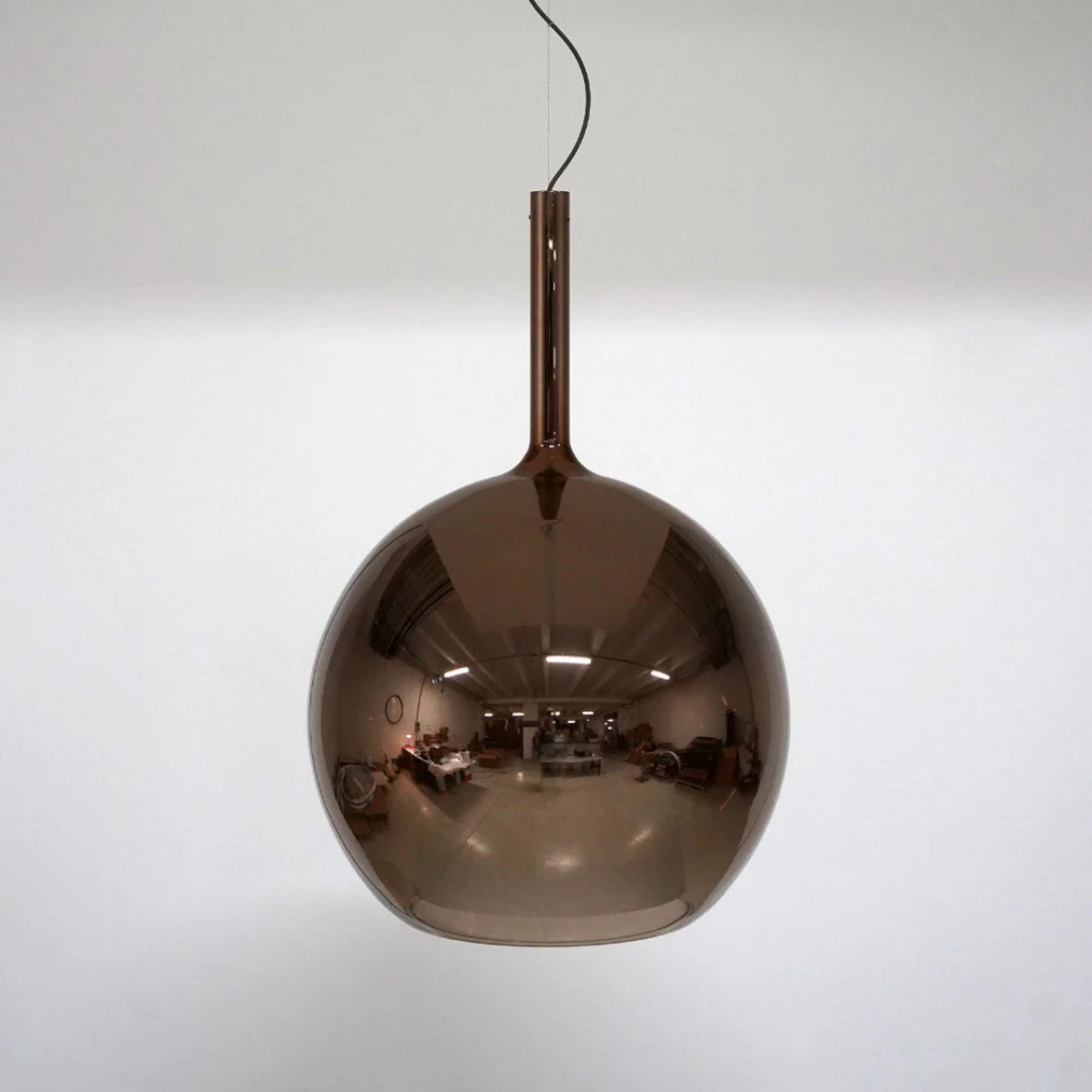 Penta Italian designer lighting featuring sculptural mirrored floor and pendant lights displayed in a luxury Singapore showroom