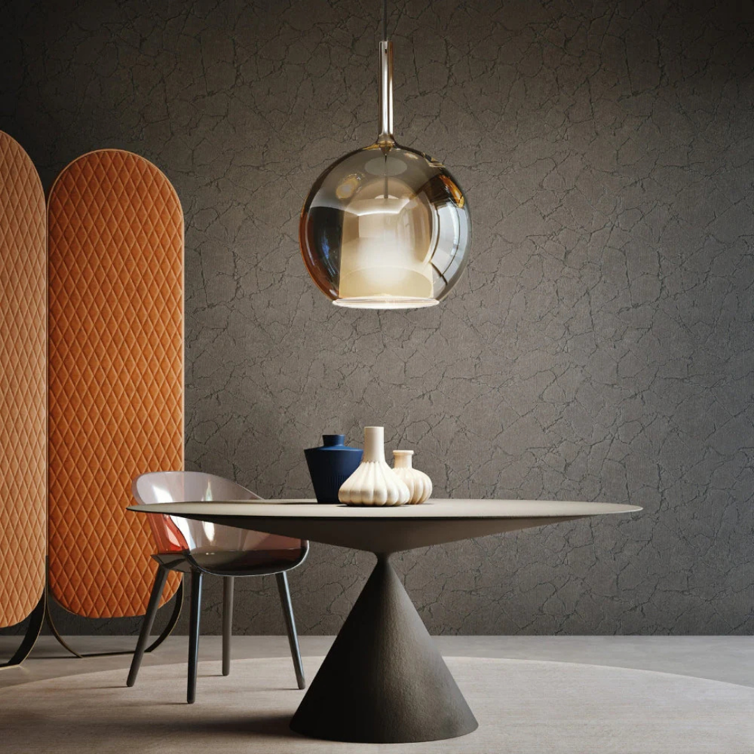 Penta Italian designer lighting featuring sculptural mirrored floor and pendant lights displayed in a luxury Singapore showroom