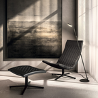 Penta Italian designer lighting featuring sculptural mirrored floor and pendant lights displayed in a luxury Singapore showroom