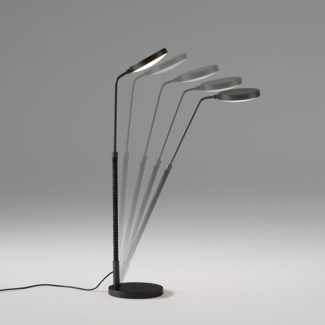 Penta Italian designer lighting featuring sculptural mirrored floor and pendant lights displayed in a luxury Singapore showroom