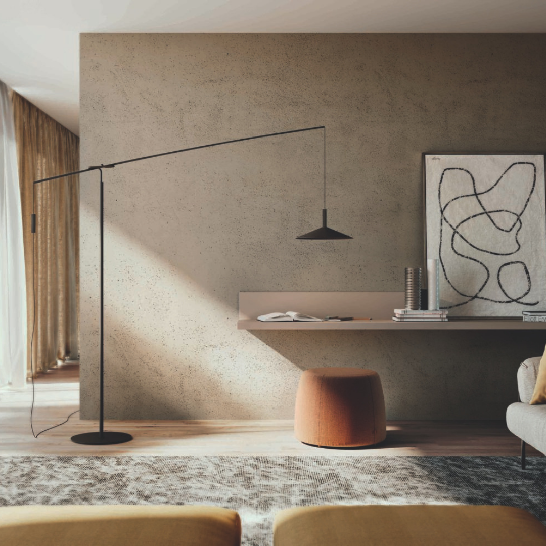 Penta Italian designer lighting featuring sculptural mirrored floor and pendant lights displayed in a luxury Singapore showroom