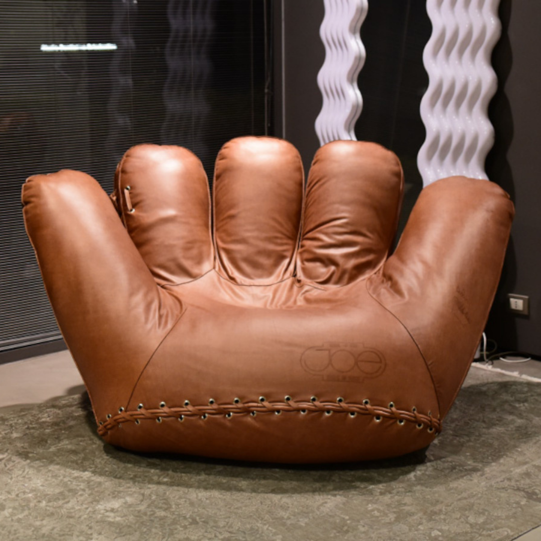 Luxury lounge armchair from Royal Interiors Singapore — designer seating crafted for modern comfort and timeless style.