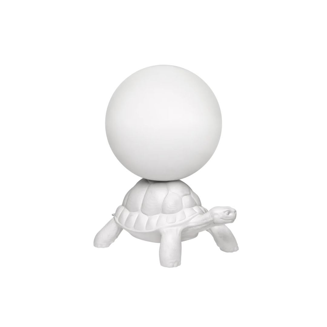 Qeeboo designer furniture and lighting available at Royal Interiors Singapore, including Rabbit Chairs, Giraffe in Love lamps, and unique Italian home accessories.