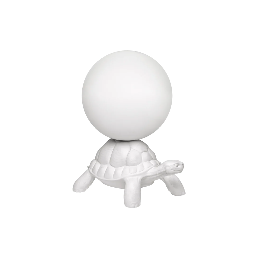 Qeeboo designer furniture and lighting available at Royal Interiors Singapore, including Rabbit Chairs, Giraffe in Love lamps, and unique Italian home accessories.